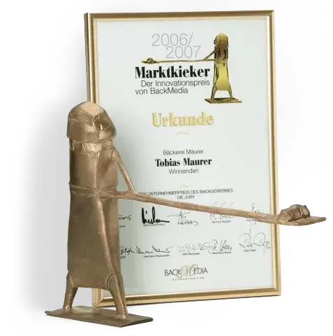 Marktkieker-Auszeichnung mit Bronzefigur und Urkunde für Tobias Maurer